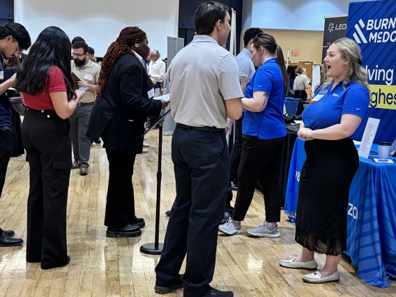 students interact with employers at a job far held in the Student Union Memorial Center