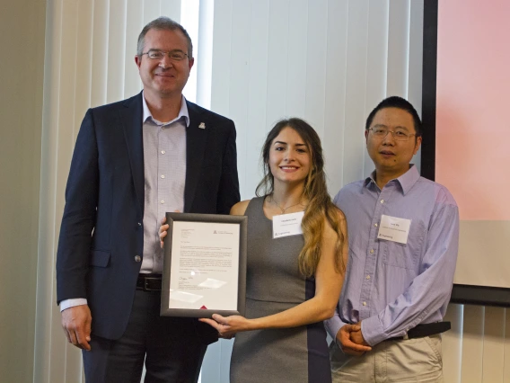 Elizabeth Pelto, outstanding senior in industrial engineering, with nominator Sean Wu and Craig M. Berge Dean David Hahn.