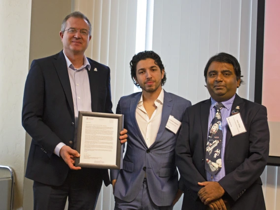 Jesse Samitas-Chavarria, outstanding senior in aerospace engineering, with nominator Jekan Thanga and Craig M. Berge Dean David Hahn.