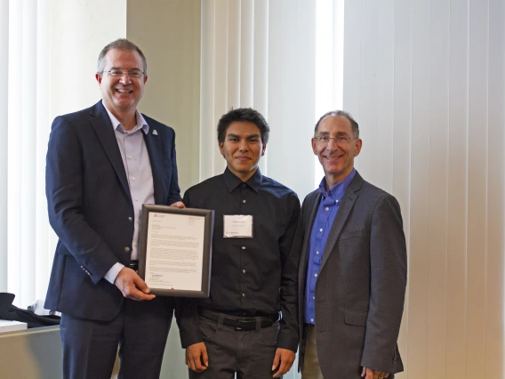 Daylan Toledo, outstanding senior in civil engineering, with nominator Dean Papajohn and Craig M. Berge Dean David Hahn.