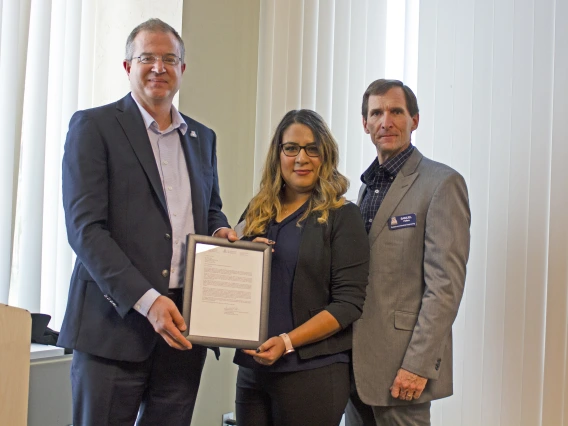 Yesenia Machuca, outstanding senior in systems engineering, with nominator Sam Peffers and Craig M. Berge Dean David Hahn.