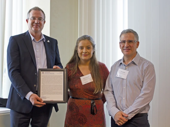 Marissa Lopez-Pier, outstanding graduate student in biomedical engineering, with nominator John Konhilas and Craig M. Berge Dean David Hahn.