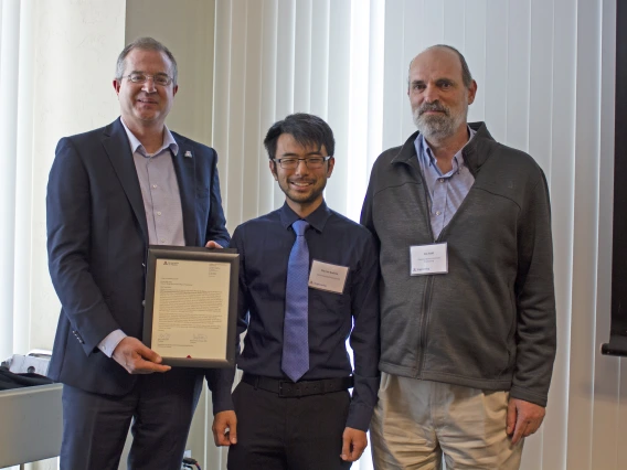 Warren Kadoya, outstanding graduate student in environmental engineering, with nominator Jim Field and Craig M. Berge Dean David Hahn.