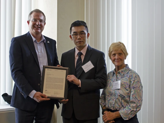 Ao Li, outstanding graduate student in electrical and computer engineering, with nominator Linda Powers and Craig M. Berge Dean David Hahn.