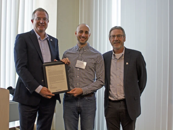 Blase LaSala, outstanding graduate student in mining and geological engineering, with nominator John Kemeny and Craig M. Berge Dean David Hahn.