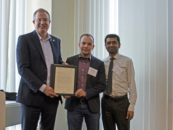 Jose Luis Ruiz Duarte, outstanding graduate student in systems and industrial engineering, with nominator Vignesh Subbian and Craig M. Berge Dean David Hahn.