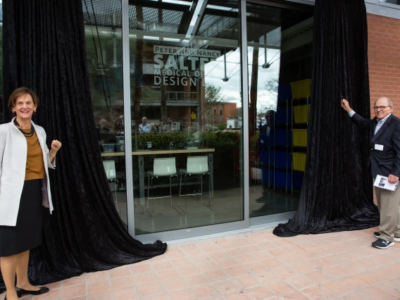 The grand reveal: Peter and Nancy Salter pull back the curtain on the new facility.