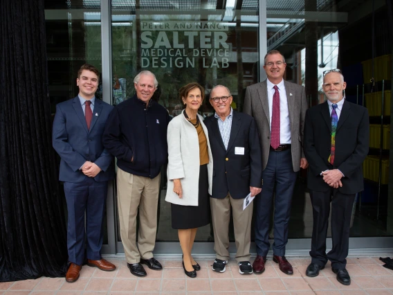 Medical Device Club President Jakob Bakall Loewgren, University of Arizona President Robert C. Robbins, Nancy and Peter Salter, College of Engineering Craig M. Berge Dean David Hahn, and Department of Biomedical Engineering Head Art Gmitro.