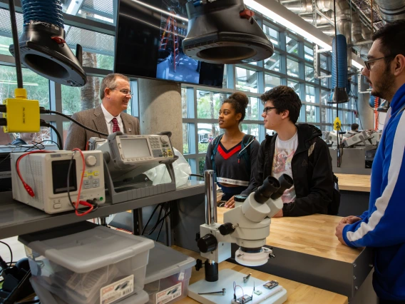 David Hahn, Craig M. Berge dean of the College of Engineering, speaks with a group of students.