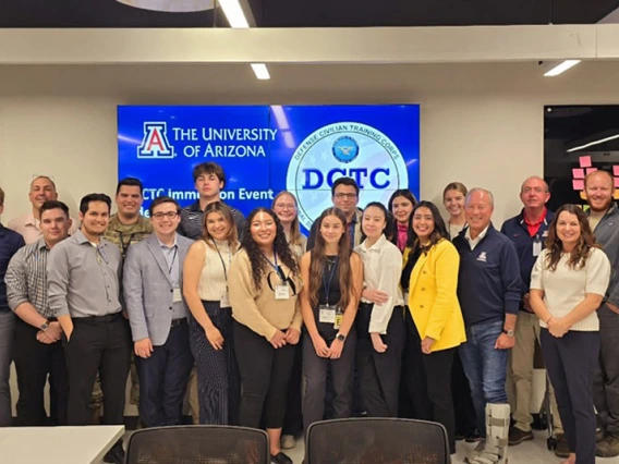 a large group in a University of Arizona classroom