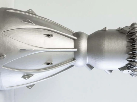 a silver 3D-printed part shaped like two funnels connected on the narrow end