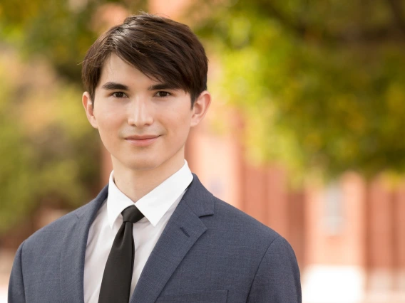 Daniel Wieland wearing a suit and tie.