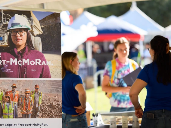a booth at an outdoor exhibit on the U of A campus