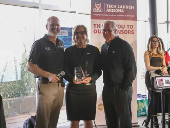 Doug Hockstad, Jennifer Barton and Dr. Robert C. Robbins