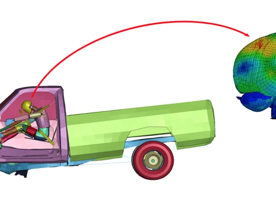 A colorful simulation of a truck running into a wall with a person inside. On the right side of the image is a zoomed-in version of the driver's brain.