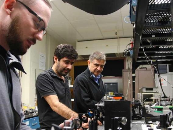 Joshua Olson, Veysi Demir and Nasser Peyghambarian in the lab