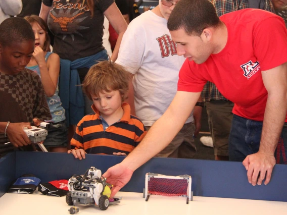 kids playing with robots
