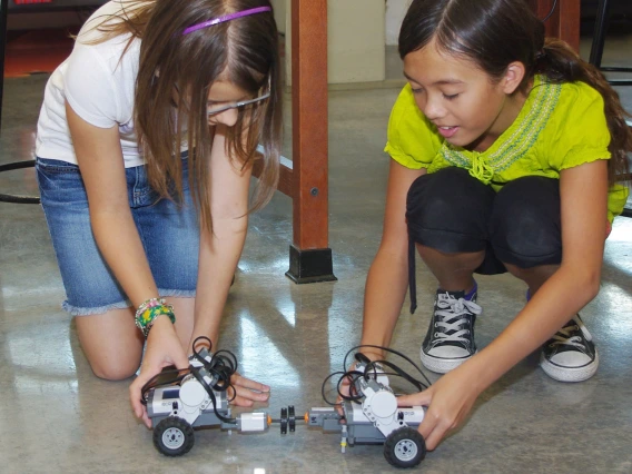 kids playing with robots