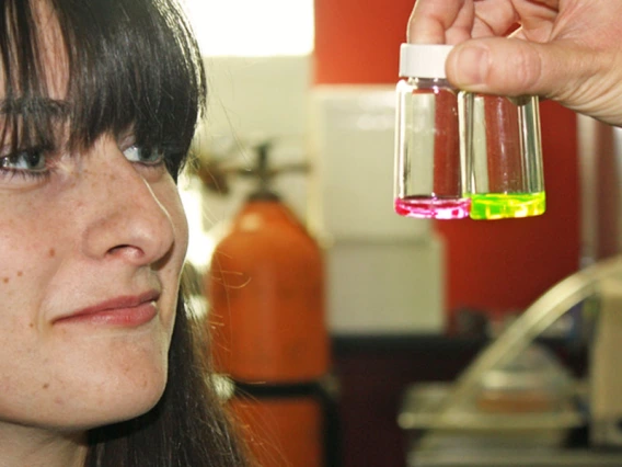 woman and sample bottles