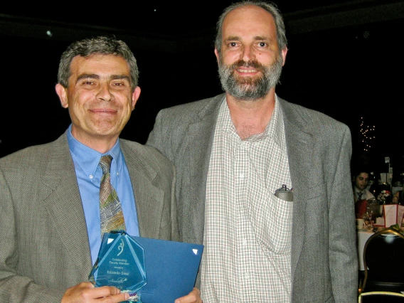 professors accept awards