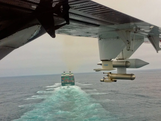 view of ship and ocean from plane