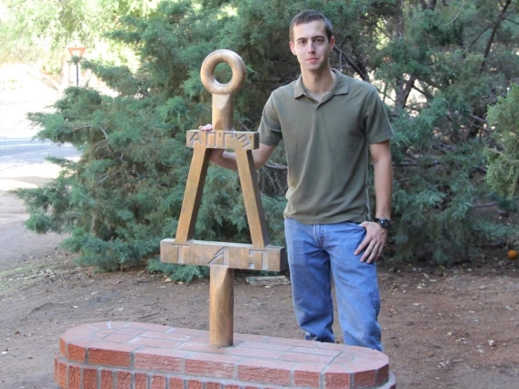 student with sculpture