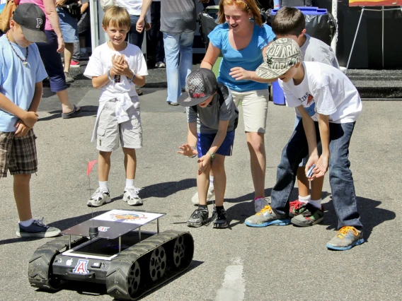 children playing with robot