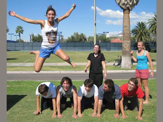 students doing acrobatics