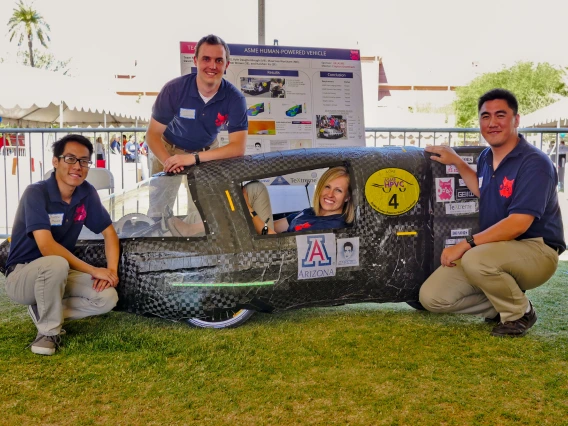 Engineering seniors with their human-powered vehicle