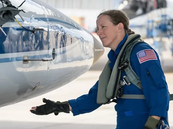 Jessica Wittner examines an airplane