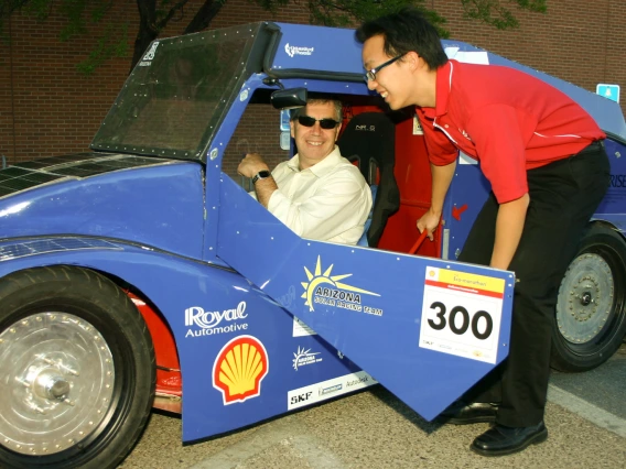 dean and student with solar car