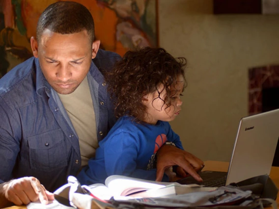 parent and child studying at home