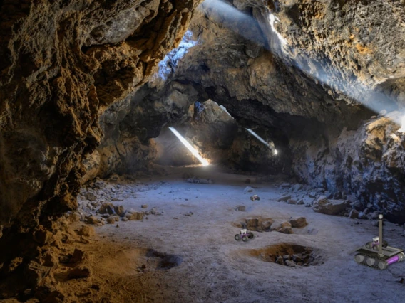 artist's impression of the breadcrumb scenario, autonomous rovers can be seen exploring a lava tube after being deployed by a mother rover that remains at the entrance to maintain contact with an orbiter or a blimp