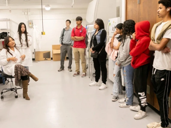 students and a professor in a University of Arizona lab