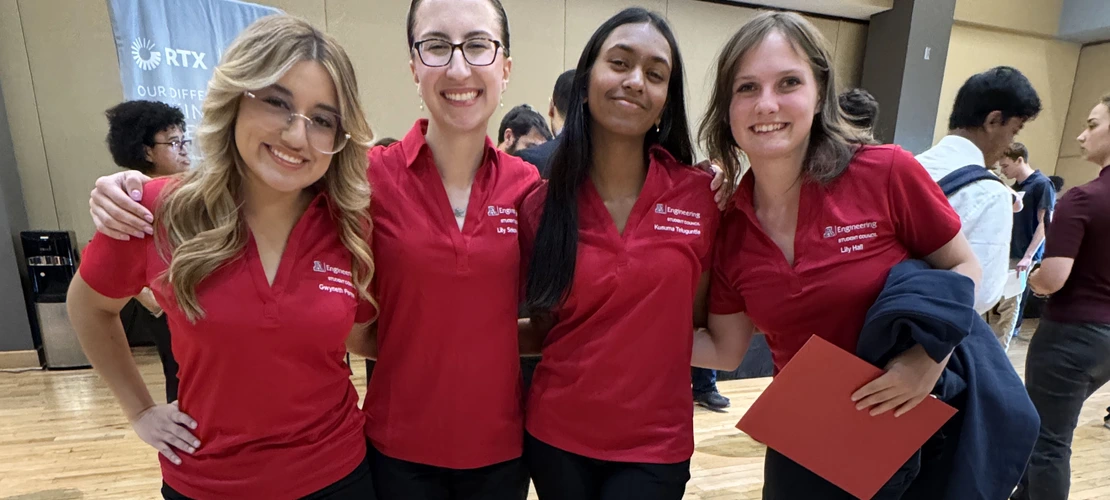 Four ESC members pose at iExpo