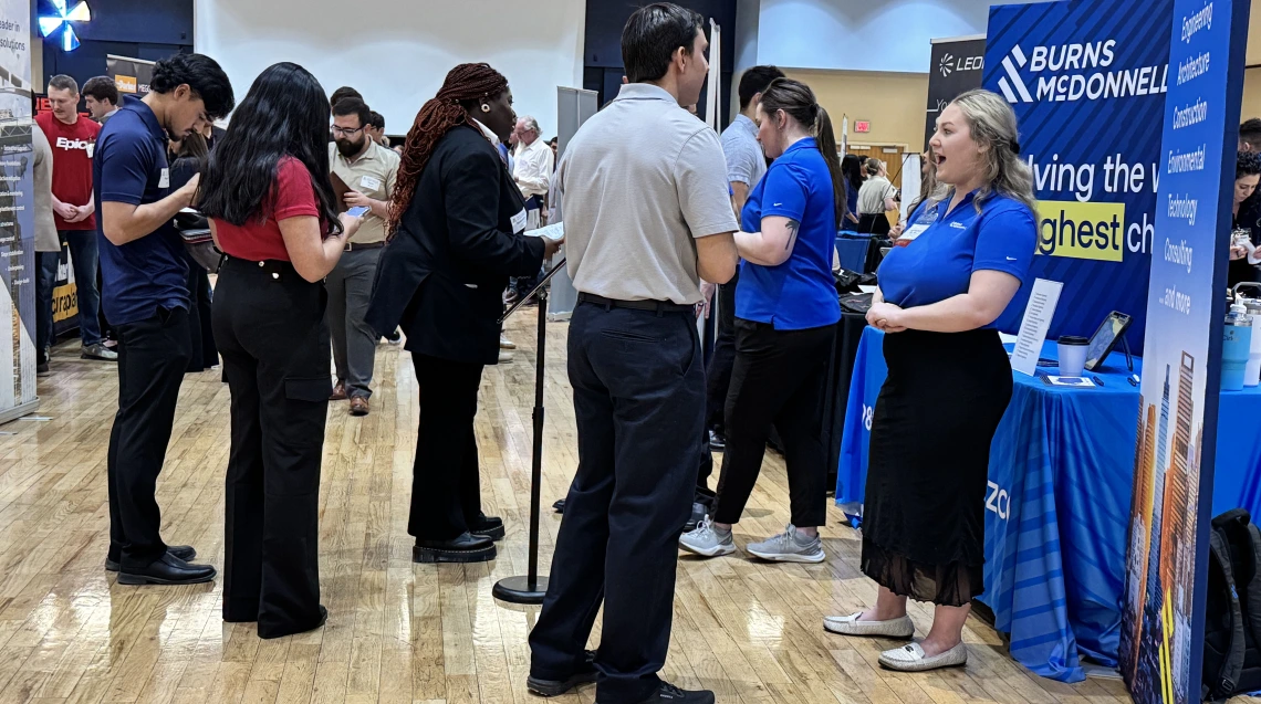 students interact with employers at a job far held in the Student Union Memorial Center