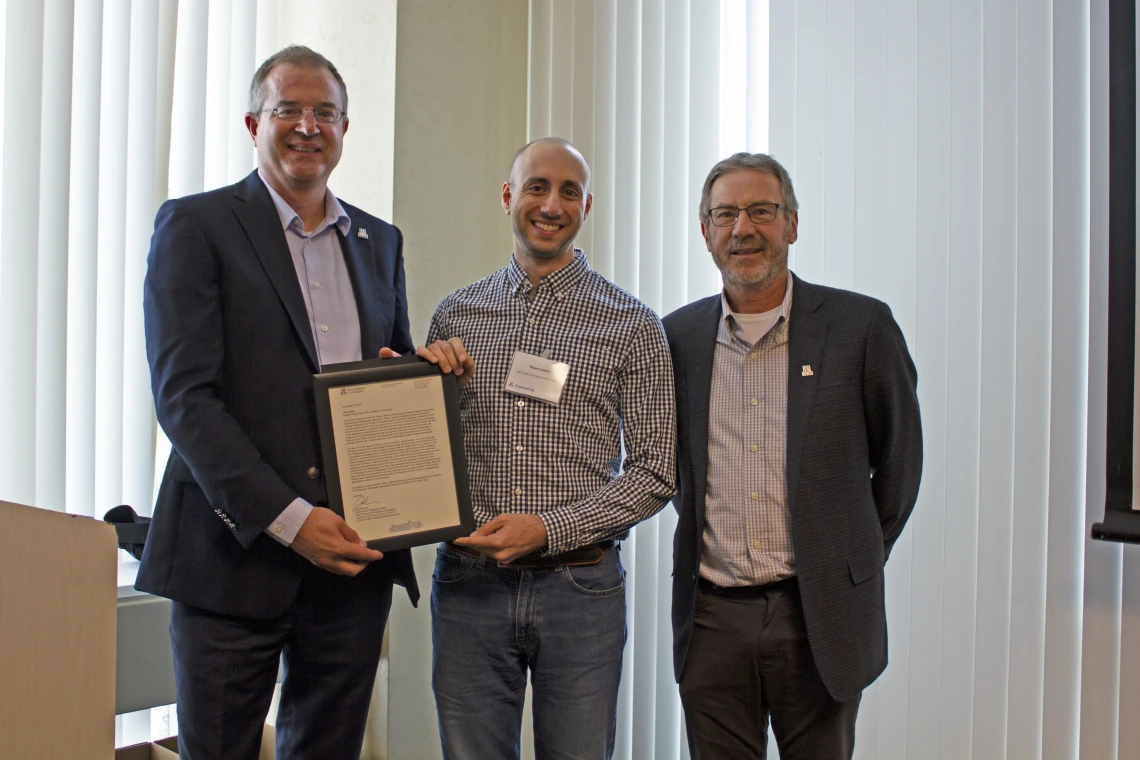 Blase LaSala, outstanding graduate student in mining and geological engineering, with nominator John Kemeny and Craig M. Berge Dean David Hahn.