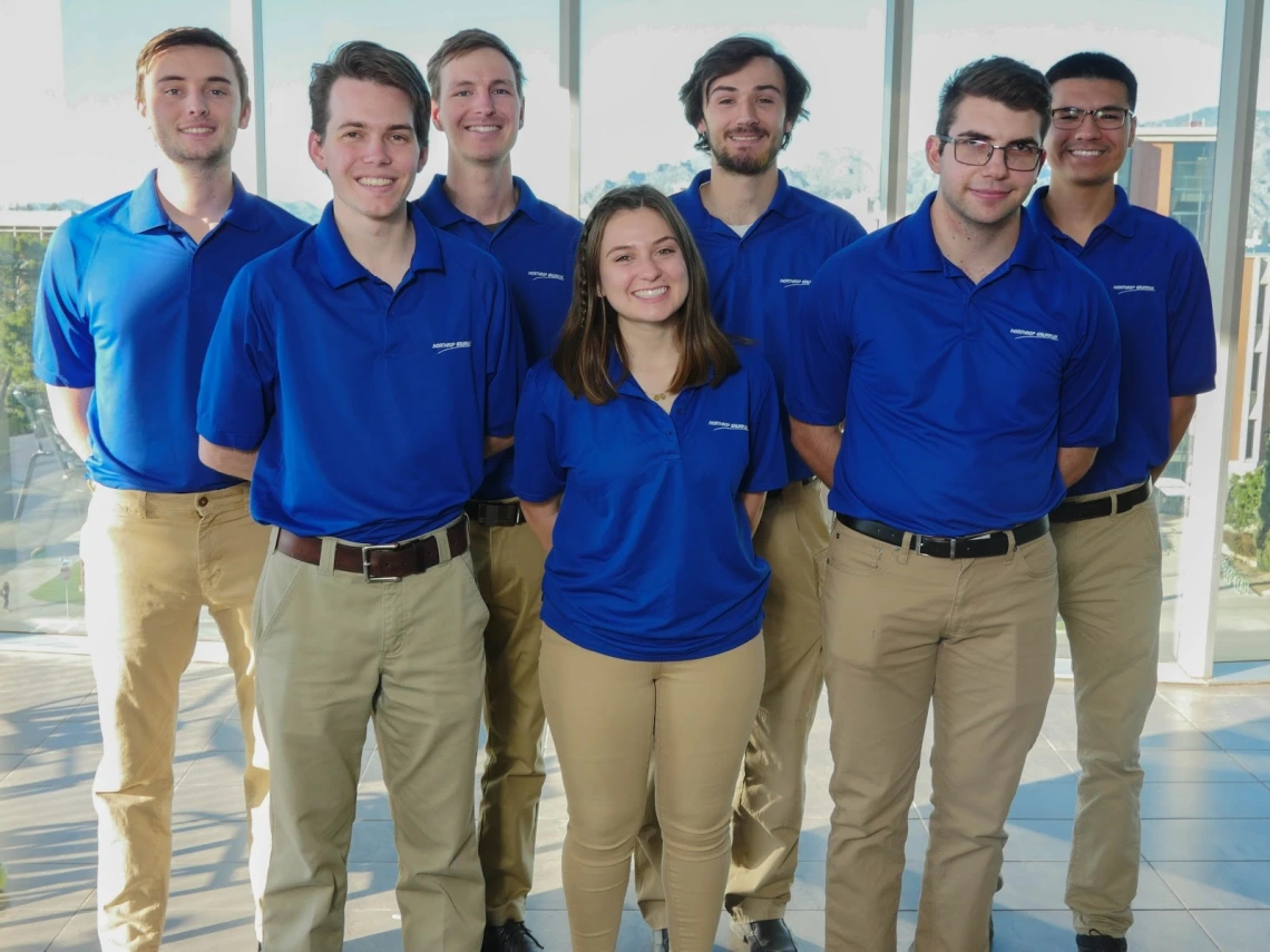 Gregory Snyder, outstanding senior in mechanical engineering, with his senior design team.