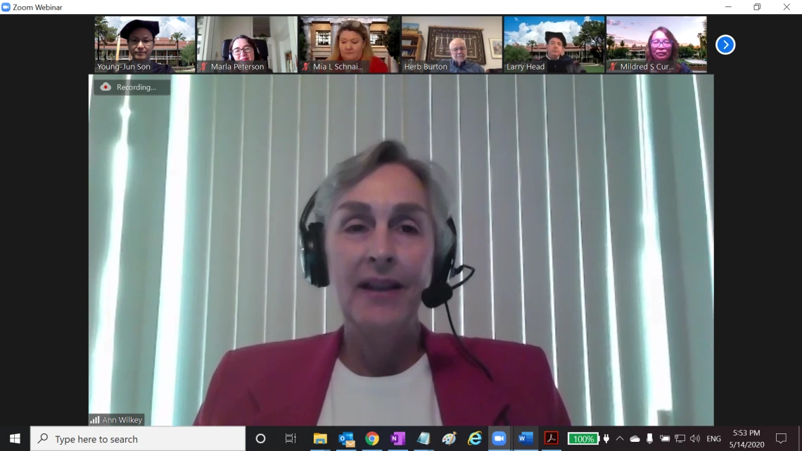 Screenshot of a Zoom meeting, with Ann Wilkey full screen and a few other people lined up across the top.