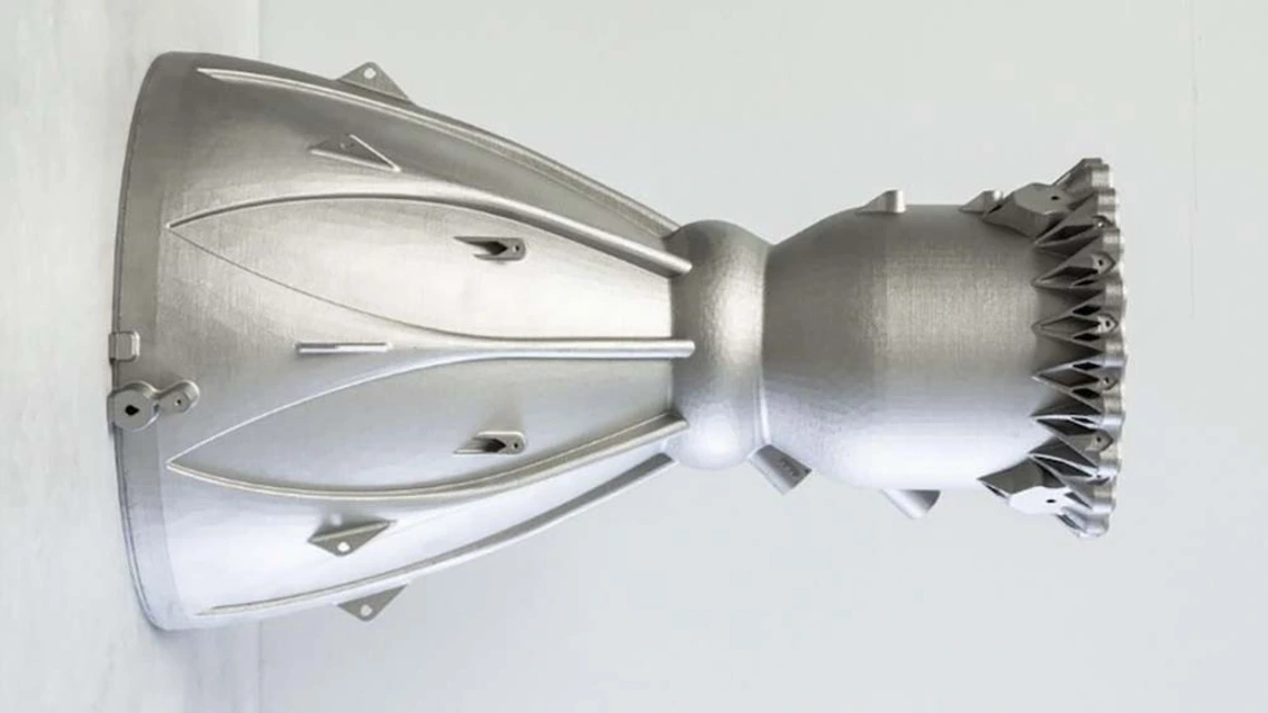 a silver 3D-printed part shaped like two funnels connected on the narrow end