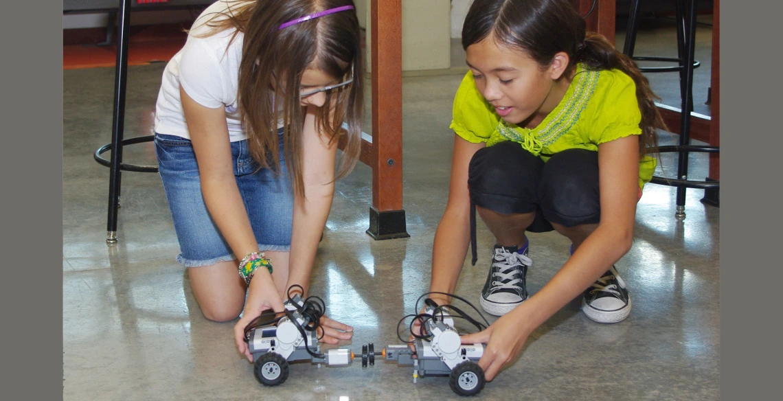 kids playing with robots