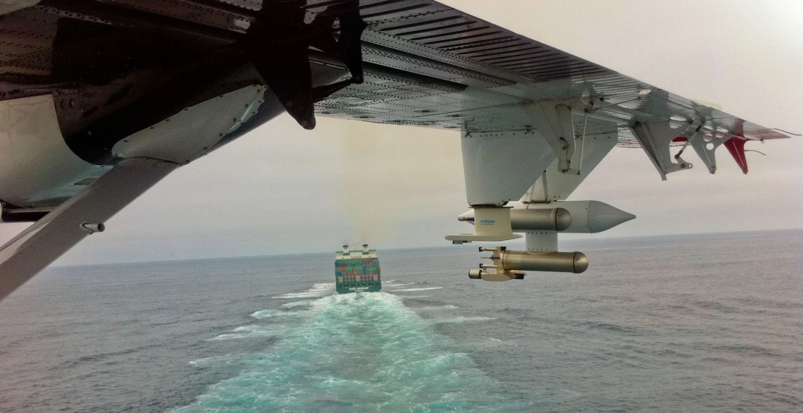 view of ship and ocean from plane