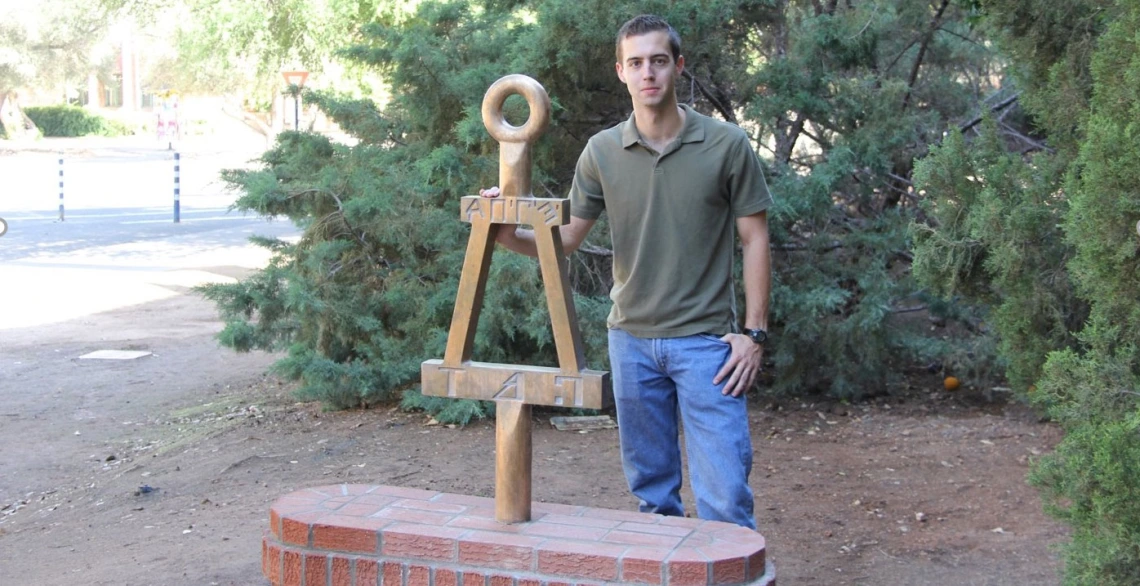 student with sculpture