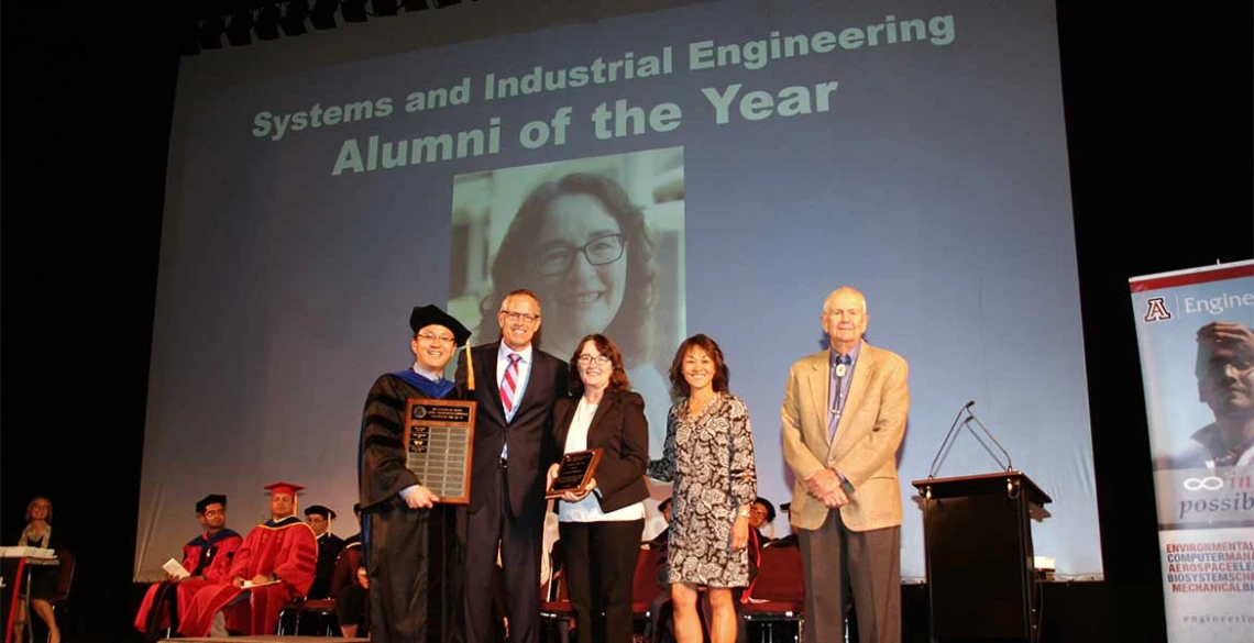 Young-Jun Son, Ted Landis, Marla Peterson, Ted Landis, Cindy Klingberg and Herb Burton on stage at SIE convocation ceremony