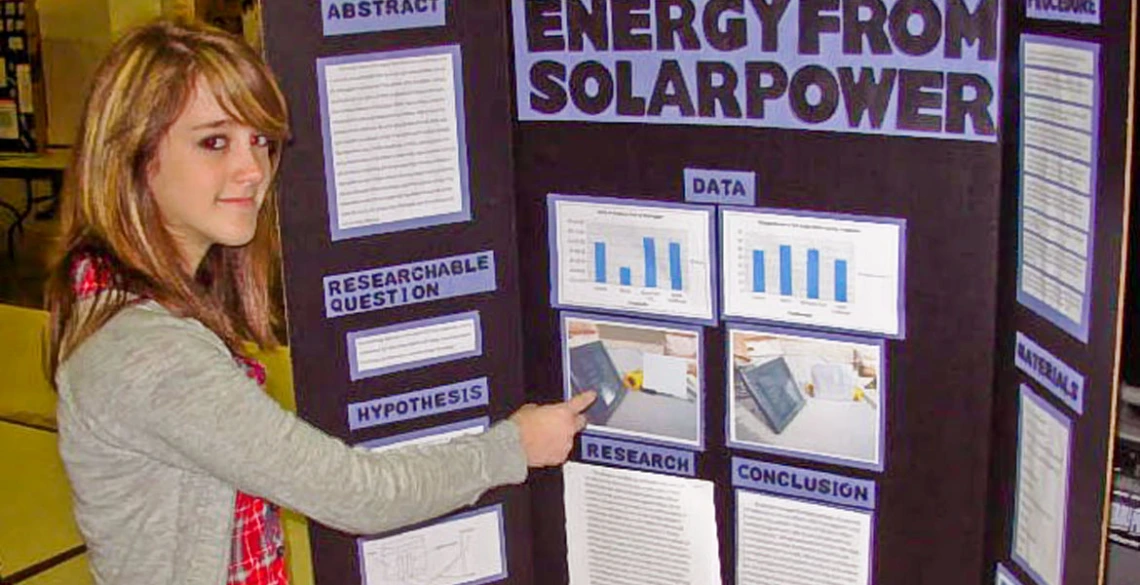 student presenting project at science fair