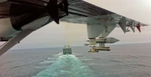 view of ship and ocean from plane