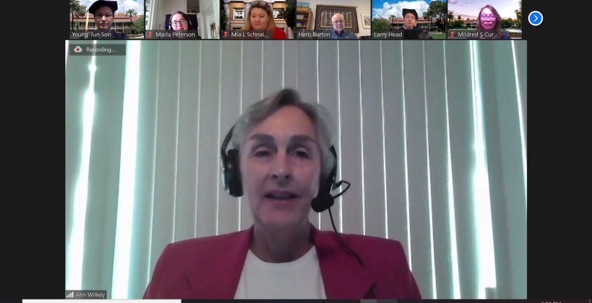 Screenshot of a Zoom meeting, with Ann Wilkey full screen and a few other people lined up across the top.
