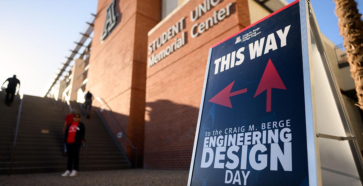 a sign for Craig M. Berge Design Day outside SUMC