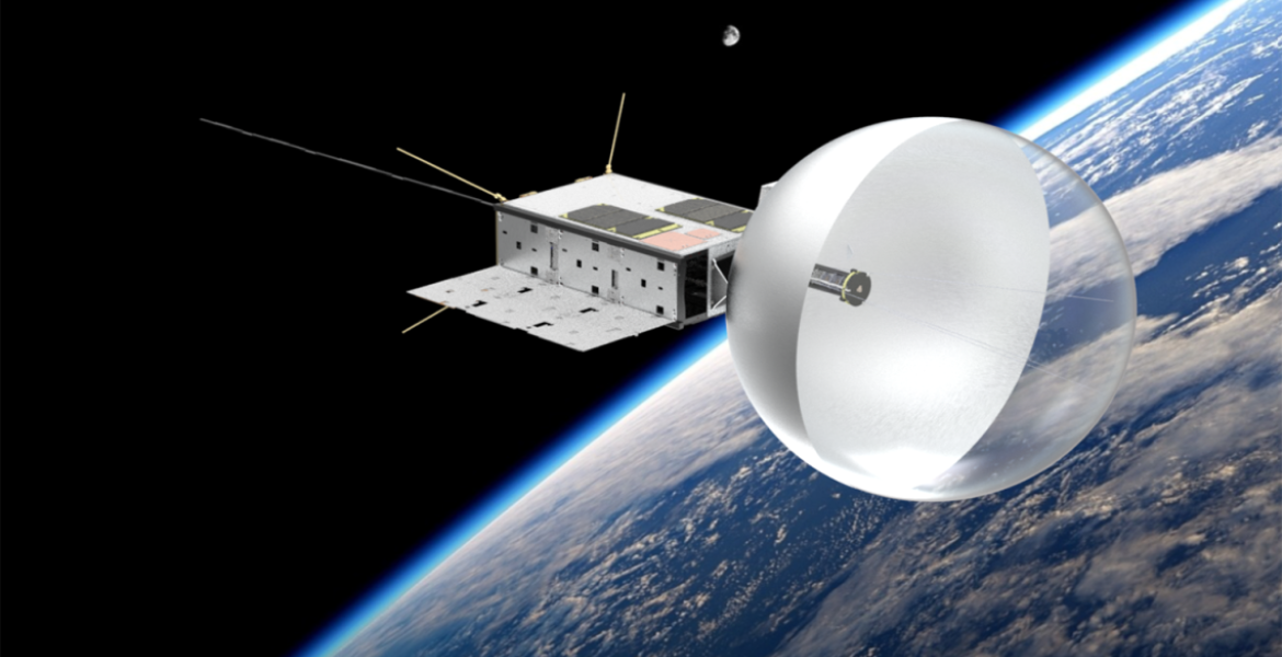 A cube-like box drifts around earth with a beach-ball like antenna on its right side.