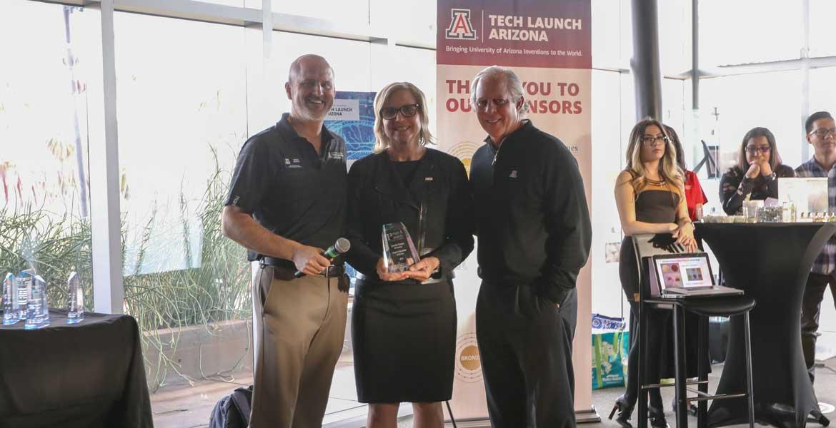 Doug Hockstad, Jennifer Barton and Dr. Robert C. Robbins